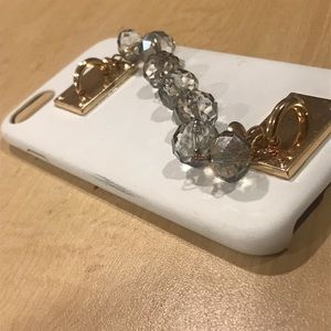 White iPhone 7/8 phone case. Diamond handle.